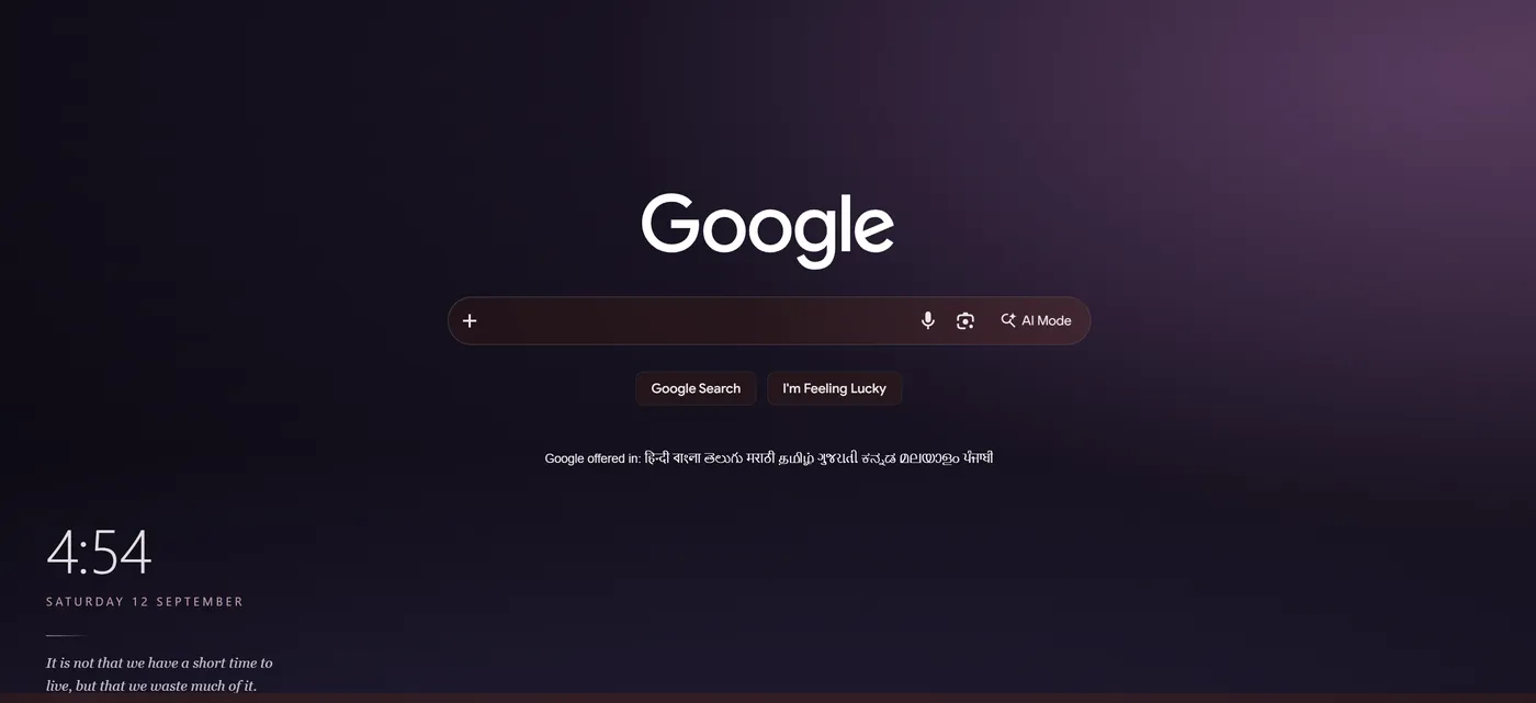 The Dusk theme on Google: a deep plum background, with the time, the date and a quote of the day in the corner.
